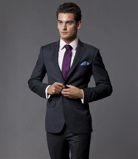 charcoal grey suit purple shirt.